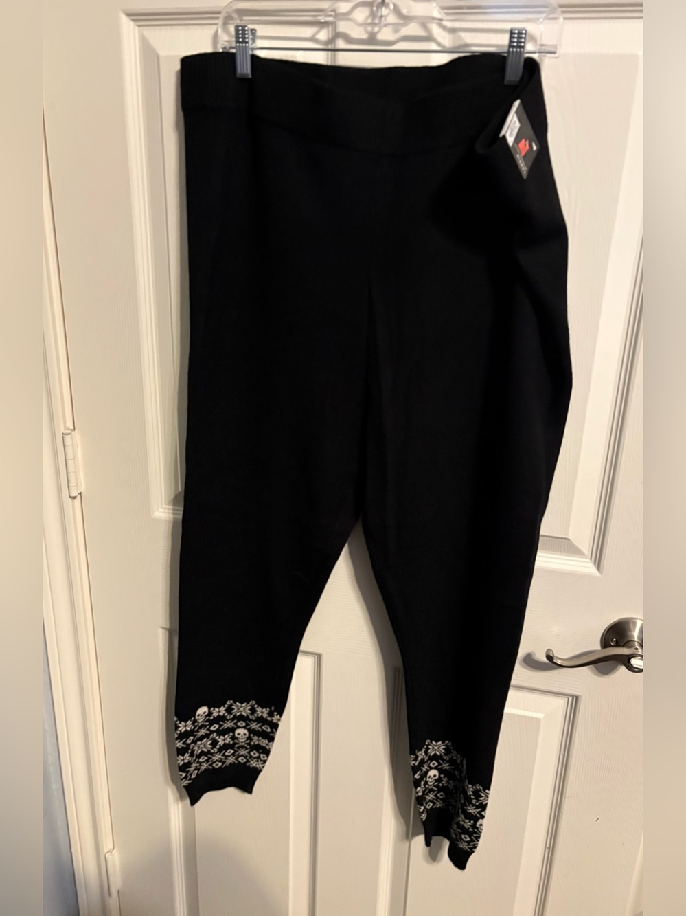 490- NWT torrid skull sweater leggings